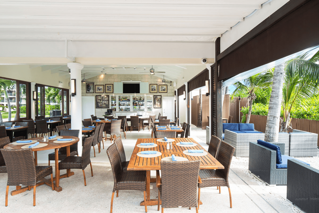 modern dining space with natural lights and decorative photo frames