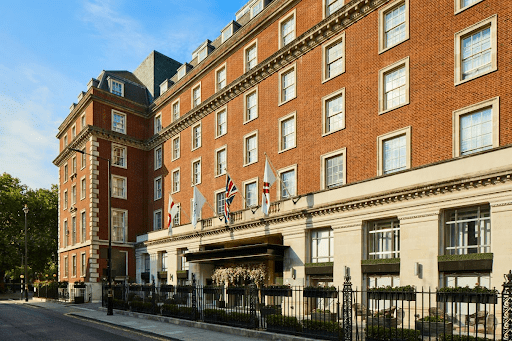 Road view of a building with red walls