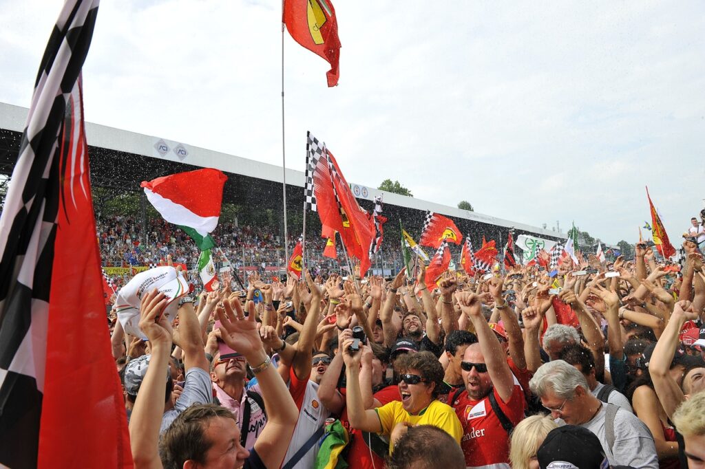 Fans cheering at a football ground